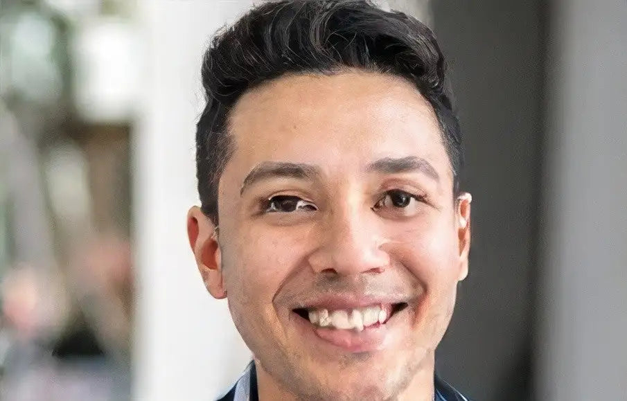 Blue denim shirt with white collar and cuffs