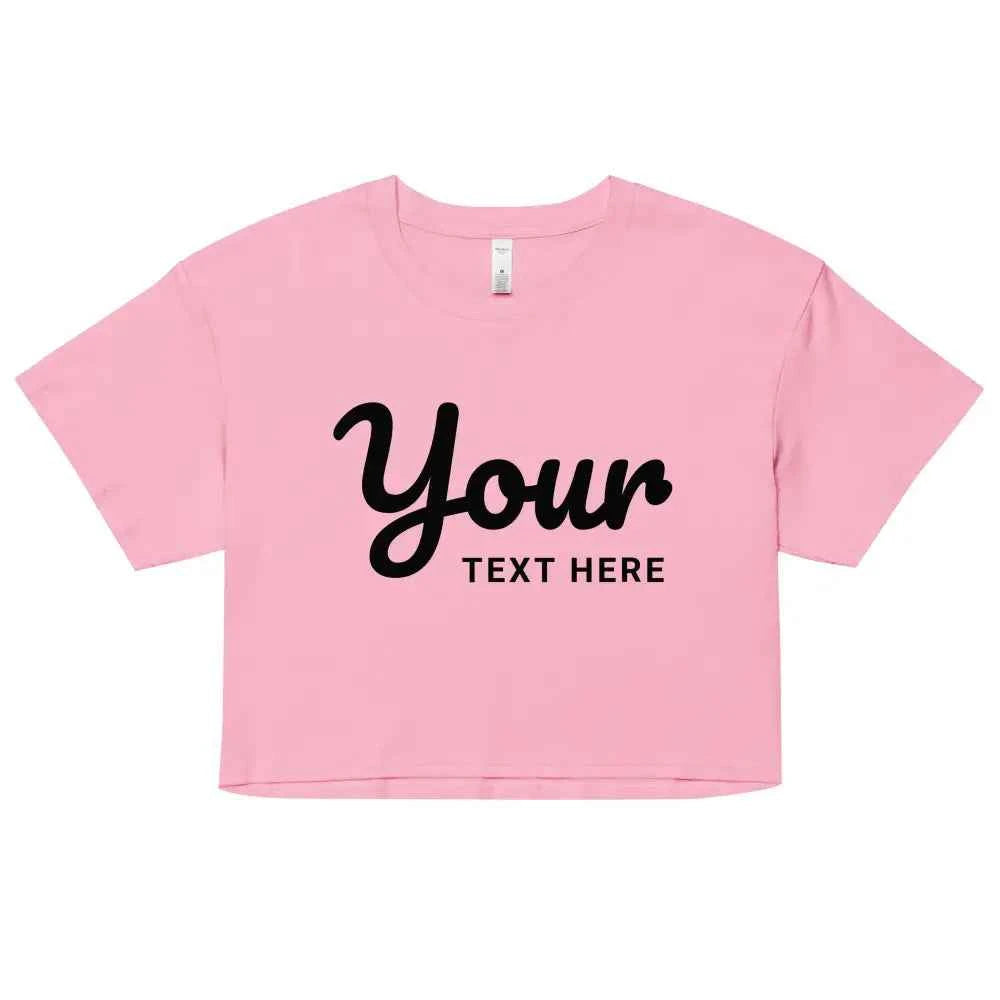 Custom streetwear relaxed fit crop top in pink with black text design for women’s apparel