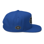 Royal blue RC Monogram flat bill snapback cap with white logo patch