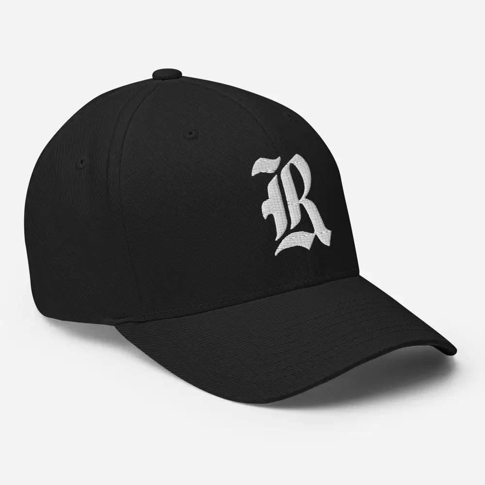 Black flexi fit baseball cap with white gothic JR puff embroidery
