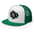 RC Legacy Snapback Cap: Green and white trucker hat with black logo