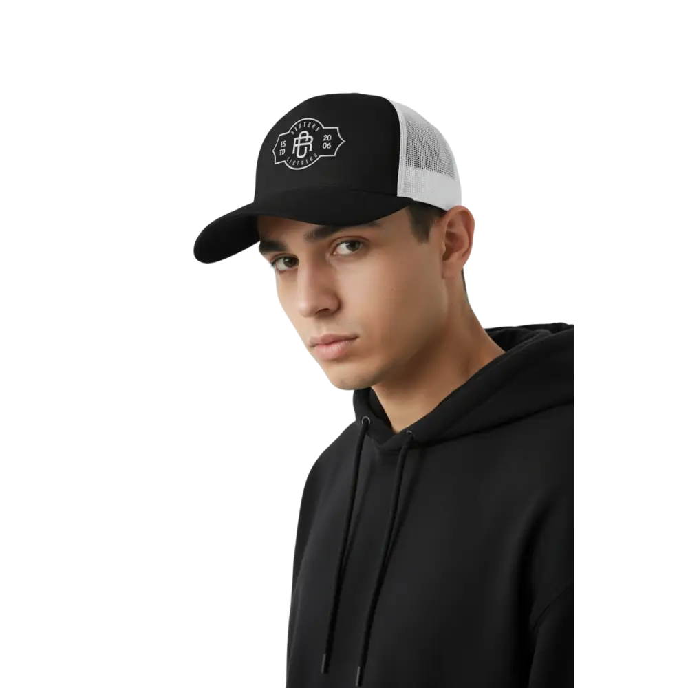 Black and white RC Legacy snapback cap with mesh back and embroidered logo