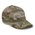Hustle Hard flexi fit baseball cap with camouflage design and white text