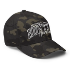 Hustle Hard flexi fit baseball cap with white logo on camo fabric by Redtorn