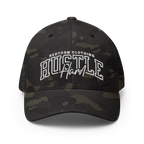 Hustle Hard flexi fit baseball cap with camouflage design and adjustable strap