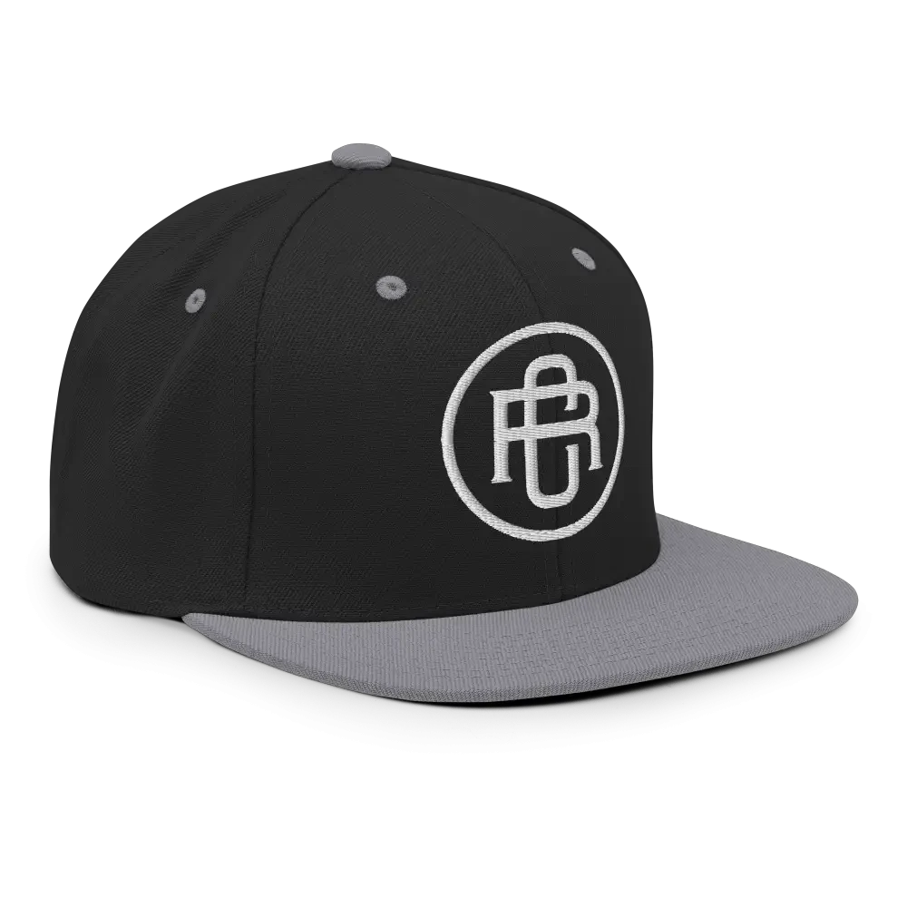 Black and gray RC Circle Logo snapback cap with white flat bill logo