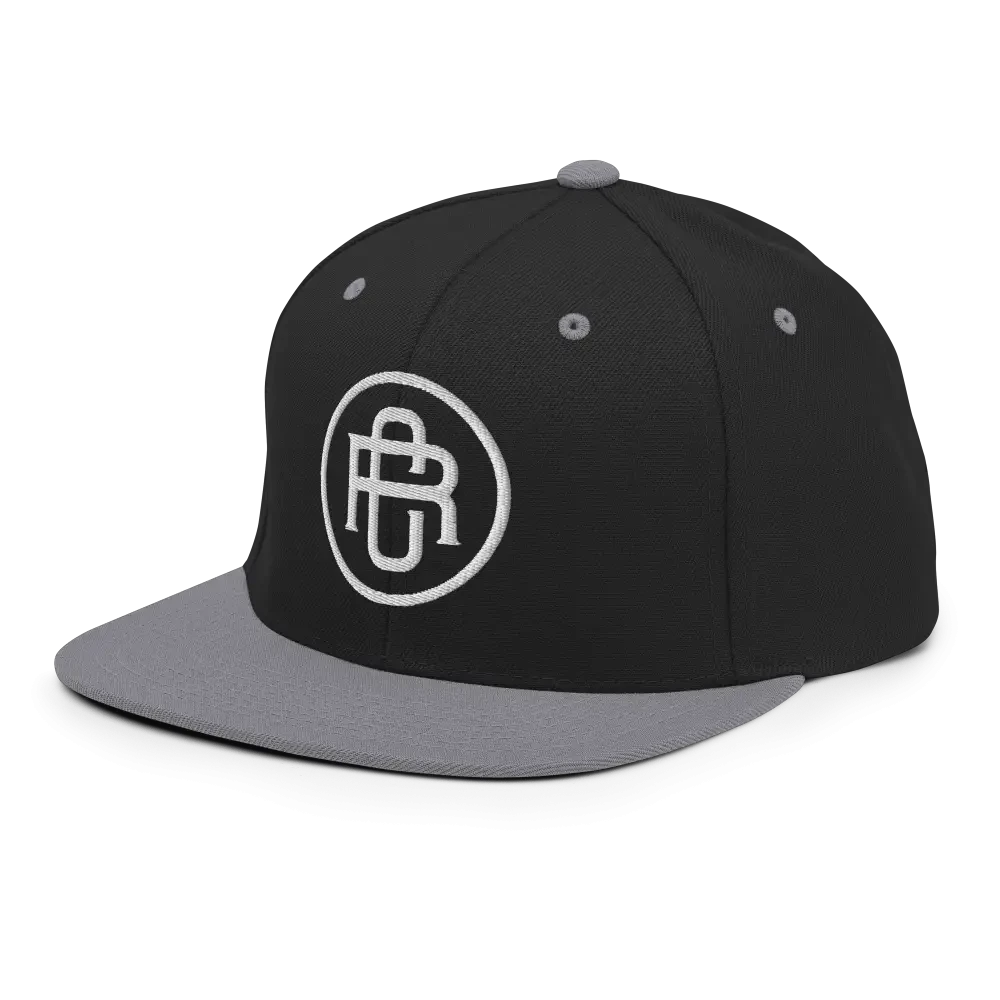 Black and gray RC Circle logo snapback cap with flat bill