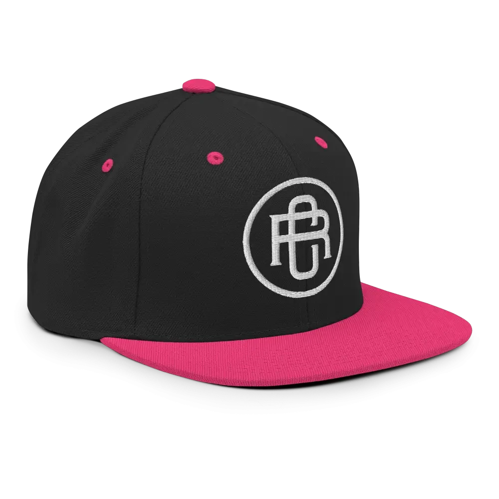 Black and pink RC Circle logo snapback cap with flat bill