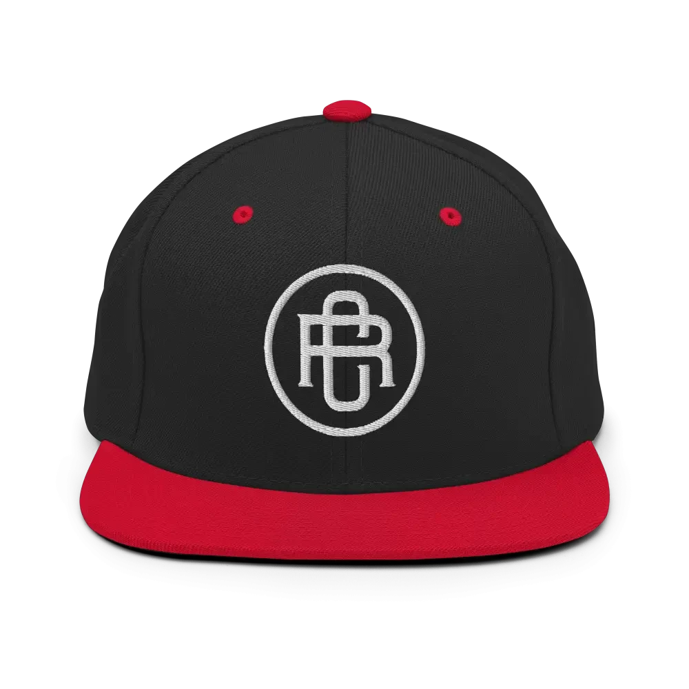 Black and red RC circle logo snapback cap with flat bill