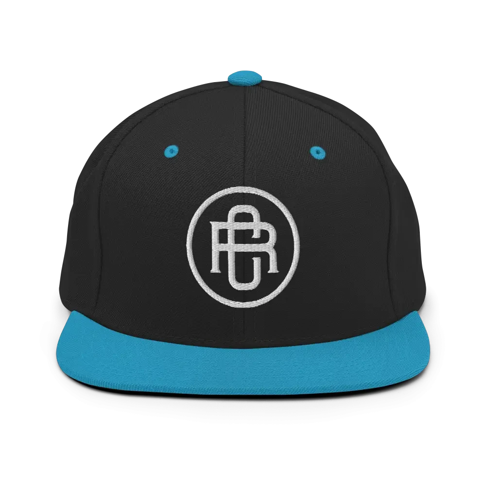 Black and teal RC Circle logo snapback cap with flat bill
