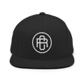 Black RC Circle logo snapback cap with flat bill