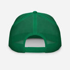 Green mesh trucker cap with adjustable strap and curved brim unisex headwear